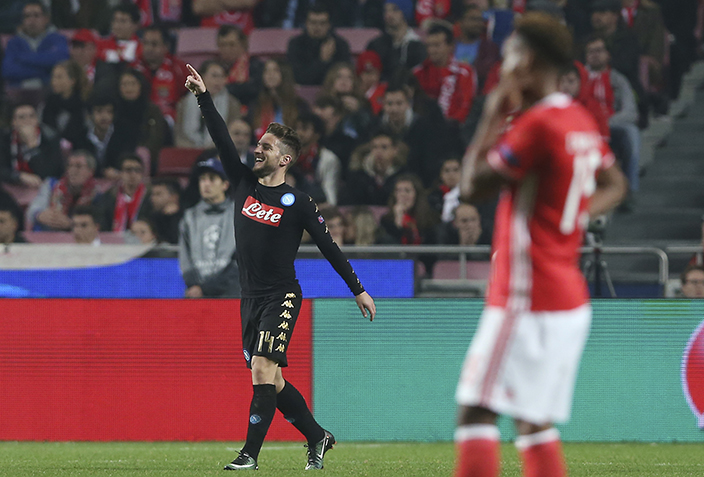 Napoli's Dries Mertens, left, celebrates after scoring during the Champions League group B soccer match between Benfica and Napoli at the Luz stadium in Lisbon, Portugal, Tuesday, Dec. 6, 2016. (AP Photo/Steven Governo)