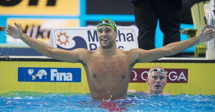 Chad Le Clos of South Africa celebrates his gold medal victory in the men's 50-meter butterfly at the FINA World Swimming Championships short-course Saturday, Dec. 10, 2016 in Windsor, Ontario. (Paul Chiasson/The Canadian Press via AP)