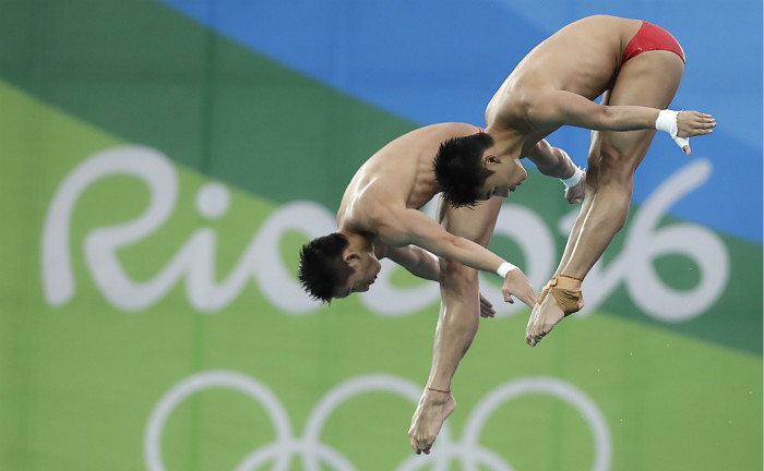 陳艾森在里約奧運會搭檔林躍。（AP圖片)