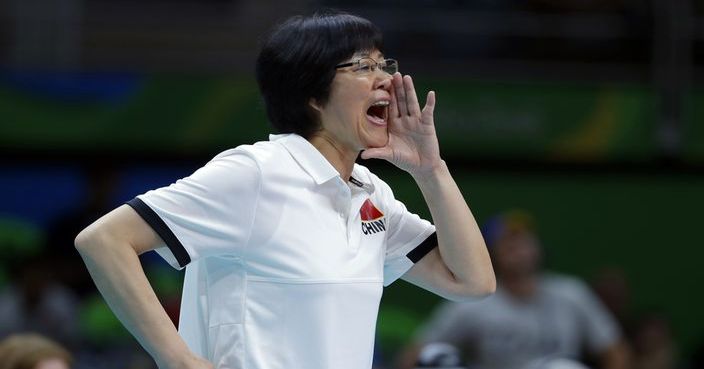 China head coach Jenny Lang Ping watches from the sidelines during a women's semifinal volleyball match against the Netherlands at the 2016 Summer Olympics in Rio de Janeiro, Brazil, Thursday, Aug. 18, 2016. (AP Photo/Jeff Roberson)