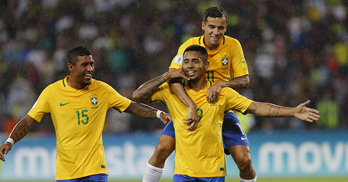 Brazil's G. Jesus, center, gestures as he celebrates with teammates, after scoring a goal against Venezuela during a 2018 World Cup qualifying soccer match in Merida, Venezuela, Tuesday, Oct. 11, 2016.  (AP Photo/Ariana Cubillos)