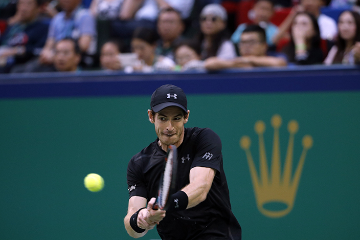 Andy Murray of Britain hits a return shot against Roberto Bautista Agut of Spain during the men's singles final of the Shanghai Masters tennis tournament at Qizhong Forest Sports City Tennis Center in Shanghai, China, Sunday, Oct. 16, 2016. (AP Photo/Andy Wong)