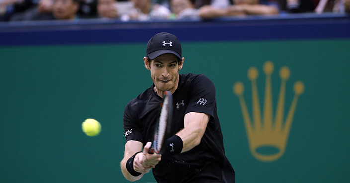 Andy Murray of Britain hits a return shot against Roberto Bautista Agut of Spain during the men's singles final of the Shanghai Masters tennis tournament at Qizhong Forest Sports City Tennis Center in Shanghai, China, Sunday, Oct. 16, 2016. (AP Photo/Andy Wong)