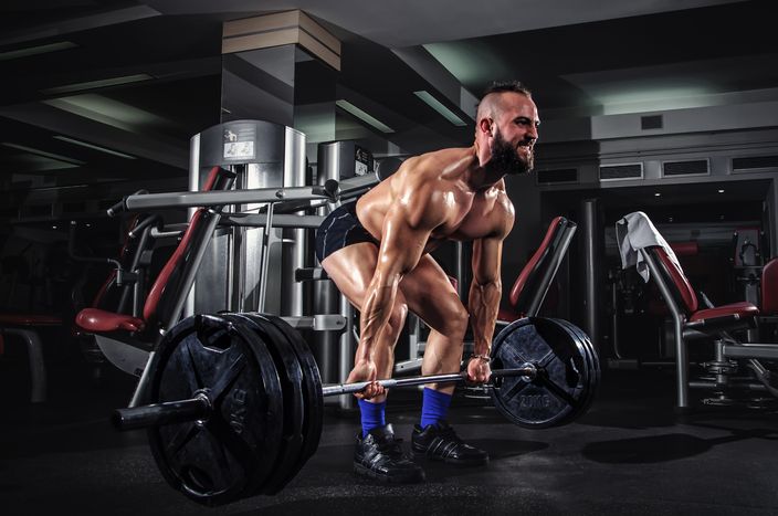 Muscular Man Doing Heavy Exercise