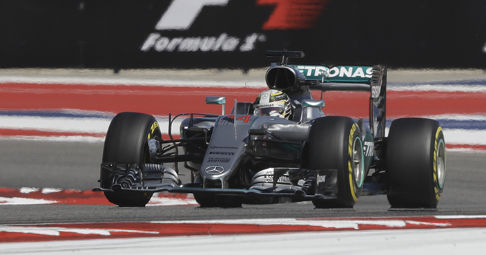 Mercedes driver Lewis Hamilton, of Britain, steers his car during qualifications for the Formula One U.S. Grand Prix auto race at the Circuit of the Americas, Saturday, Oct. 22, 2016, in Austin, Texas. (AP Photo/Darron Cummings)