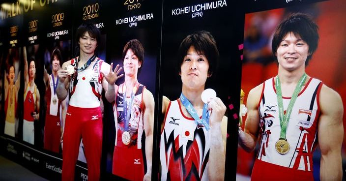 FILE - In this Oct. 30, 2015 file photo, Japan's Kohei Uchimura poses in the Walk of Champions with his sixth gold medal after winning the men's all-around final competition at the World Artistic Gymnastics championships at the SSE Hydro Arena in Glasgow, Scotland. Japanese Olympic gymnast Uchimura may be a record six-time world champion, but he won't be encountering much success in his 