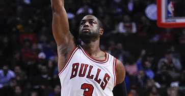Chicago Bulls guard Dwyane Wade gestures after scoring his first basket during the first quarter of an NBA basketball game against the Boston Celtics, Thursday, Oct. 27, 2016, in Chicago. (AP Photo/Matt Marton)