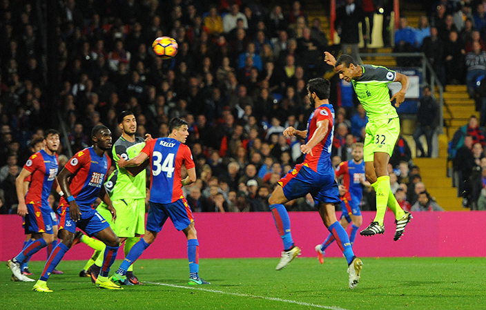Liverpool's Joel Matip, right, scores his side's third goal against Crystal Palace during the English Premier League soccer match at Selhurst Park in London, Saturday Oct. 29, 2016. (Dominic Lipinski / PA via AP)