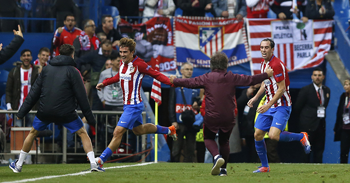 Atletico's Antoine Griezmann, left, celebrates with teammate Diego Godin, right, scoring his sides second goal during the Champions League Group D soccer match between Atletico Madrid and Rostov at the Vicente Calderon stadium in Madrid, Spain, Tuesday Nov. 1, 2016. (AP Photo/Daniel Ochoa de Olza)