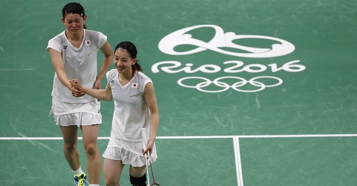 Japan's Ayaka Takahashi, left and Misaki Matsutomo, celebrate their gold medal win over Denmark's Christinna Pedersen, and Kamilla Rytter Juhl, during a women's doubles gold medal badminton match at the 2016 Summer Olympics in Rio de Janeiro, Brazil, Thursday, Aug. 18, 2016. (AP Photo/Kin Cheung)