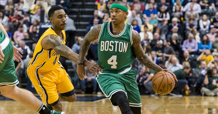 Boston Celtics guard Isaiah Thomas (4) drives the ball past the defense of Indiana Pacers guard Jeff Teague (44) in the second half of an NBA basketball game, Saturday, Nov. 12, 2016, in Indianapolis. The Celtics won 105-99. (AP Photo/Doug McSchooler)