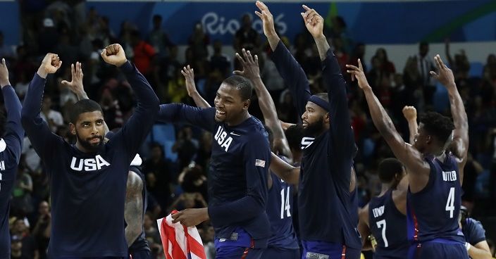 Members of the United States team celebrates winning the mens basketball gold medal at the 2016 Summer Olympics in Rio de Janeiro, Brazil, Sunday, Aug. 21, 2016. (AP Photo/Matt York)
