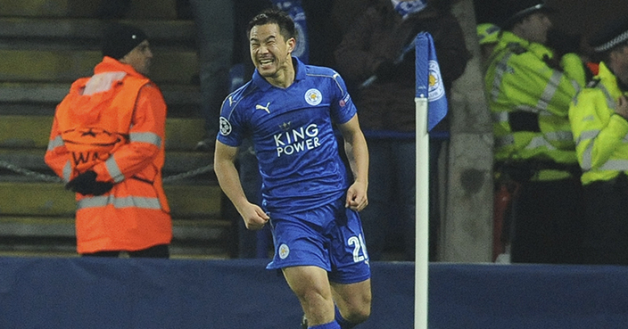 Leicester's Shinji Okazaki celebrates after scoring his side's first goal during the Champions League Group G soccer match between Leicester City and Club Brugge in Leicester, England, Tuesday, Nov. 22, 2015.(AP Photo/Rui Vieira))