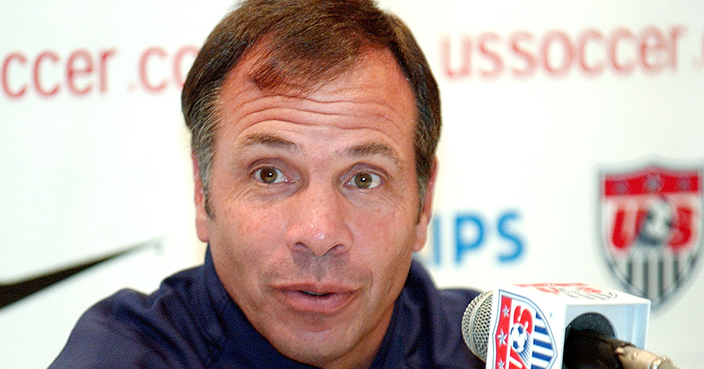 FILE - In this June 12, 2002, file photo, Bruce Arena, head coach of the U.S soccer team, addresses a questions during a news conference at the team's hotel in Seoul, South Korea, in advance of a World Cup match against Poland. Arena is returning to coach the U.S. national team, a decade after he was fired.  The winningest coach in American national team history, Arena took over Tuesday, Nov. 22, 2016, one day after Jurgen Klinsmann was fired.  (AP Photo/Tony Gutierrez, File)