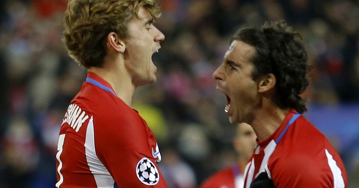 Atletico's Antoine Griezmann celebrates with Tiago scoring his side's 2nd goal during a Champions League Group D soccer match between Atletico Madrid and PSV Eindhoven at the Vicente Calderon stadium in Madrid, Spain, Wednesday, Nov. 23, 2016. (AP Photo/Francisco Seco)