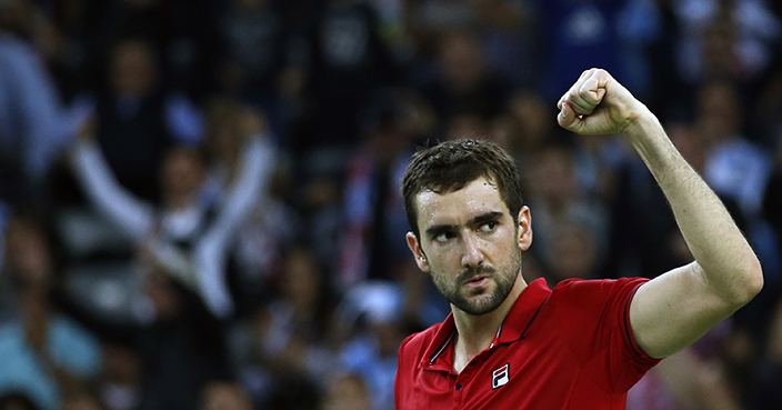 Croatia's Marin Cilic celebrates after winning his singles match against Argentina's Federico Delbonis in the Davis Cup tennis tournament final between the two countries in Zagreb, Croatia, Friday, Nov. 25, 2016.(AP Photo/Darko Vojinovic)