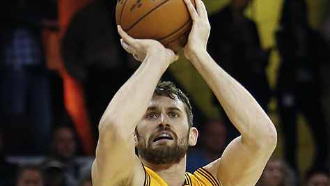 Cleveland Cavaliers' Kevin Love (0) shoots against the Dallas Mavericks during the first half of an NBA basketball game Friday, Nov. 25, 2016, in Cleveland. The Cavaliers won 128-90. (AP Photo/Ron Schwane)
