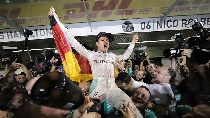 Mercedes driver Nico Rosberg of Germany celebrates winning the World Championship during the Emirates Formula One Grand Prix at the Yas Marina racetrack in Abu Dhabi, United Arab Emirates, Sunday, Nov. 27, 2016. (AP Photo/Hassan Ammar)