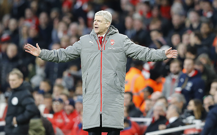 Arsenal manager Arsene Wenger gestures during the English Premier League soccer match between Arsenal and Bournemouth at Emirates stadium in London, Sunday, Nov. 27, 2016.(AP Photo/Frank Augstein)
