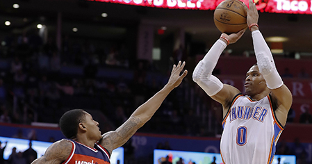 Oklahoma City Thunder guard Russell Westbrook (0) shoots over Washington Wizards guard Bradley Beal (3) during the second half of an NBA basketball game in Oklahoma City, Wednesday, Nov. 30, 2016. Oklahoma City won in overtime, 126-115. (AP Photo/Alonzo Adams)