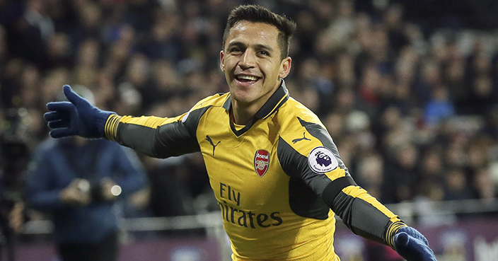 Arsenal's Alexis Sanchez celebrates after scoring a goal during the English Premier League soccer match between West Ham United and Arsenal at The London Stadium in London, Saturday Dec. 3, 2016. (AP Photo/Tim Ireland)