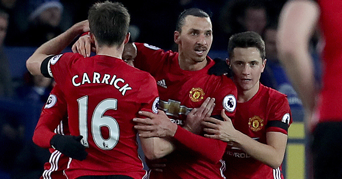 Manchester United's Zlatan Ibrahimovic, centre, celebrates scoring his side's first goal of the game, during the English Premier League soccer match between Everton and Manchester United, at Goodison Park, in Liverpool, England, Sunday Dec. 4, 2016. (Peter Byrne/PA via AP)