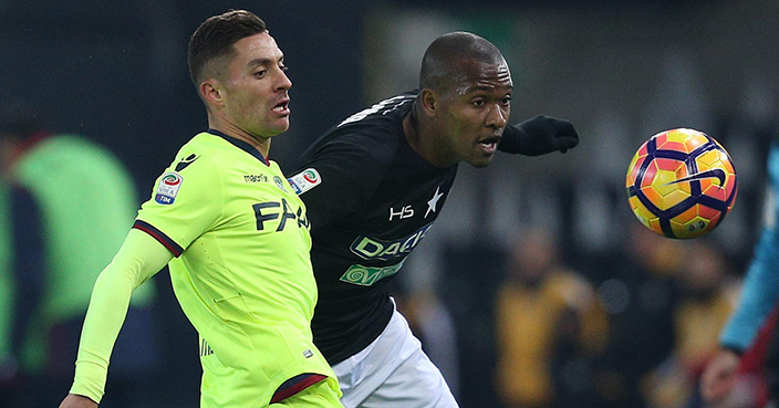 Udinese's Caetano Samir, right, and Bologna's Anthony Mounier vie for the ball during a Serie A soccer match at the Friuli stadium, Italy, Monday, Dec. 5, 2016. (Alberto Lancia /ANSA via AP)