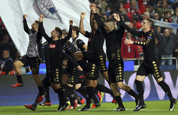 Napoli players celebrate their victory after the Champions League group B soccer match between Benfica and Napoli at the Luz stadium in Lisbon, Tuesday, Dec. 6, 2016. (AP Photo/Armando Franca)