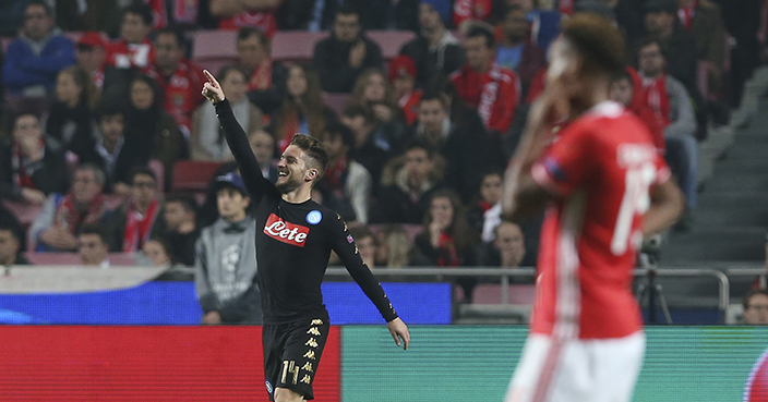 Napoli's Dries Mertens, left, celebrates after scoring during the Champions League group B soccer match between Benfica and Napoli at the Luz stadium in Lisbon, Portugal, Tuesday, Dec. 6, 2016. (AP Photo/Steven Governo)