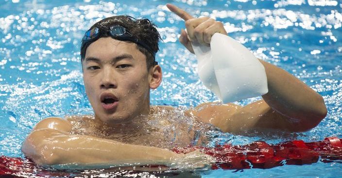 Wang Shun, of China, reacts after winning men's 200-meter individual medley at the FINA World Swimming Championships in Windsor, Ontario, Tuesday, Dec. 6, 2016. Wang won the gold medal. (Paul Chiasson/The Canadian Press via AP)