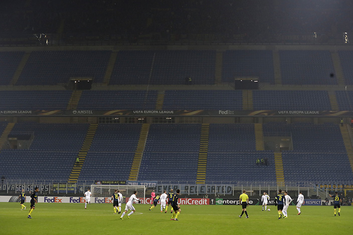 A view of the empty stands as Inter fan protested during during an Europa League Group K soccer match between Inter Milan and Sparta Prague, at the San Siro stadium in Milan, Italy, Thursday, Dec. 8, 2016. (AP Photo/Luca Bruno)