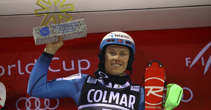Norway's Henrik Kristoffersen celebrates on the podium after winning an alpine ski, men's World Cup slalom, in Madonna di Campiglio Italy, Thursday, Dec. 22, 2016. (AP Photo/Alessandro Trovati)