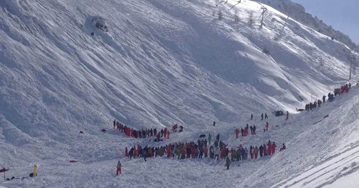 In this image made available by Victor Diwisch rescue personnel work at the site of an avalanche at Lavachet Wall in Tignes, France, Monday Feb. 13, 2017.  French rescue workers say a number of skiers have been killed in an avalanche in the French Alps near the resort of Tignes. It occurred in an area popular among international skiers for its extensive slopes and stunning views, but no information was immediately available about the skiers' nationalities. (Victor Diwisch via AP)