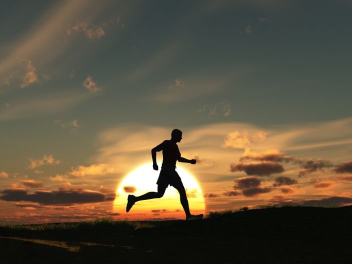 Man running at dawn