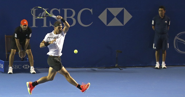 Spain's Rafael Nadal plays a return to Japan's Yoshihito Nishioka during a quarterfinal match at the Mexican Tennis Open in Acapulco, Mexico, Thursday, March 2, 2017. Nadal won the match. (AP Photo/Enric Marti)