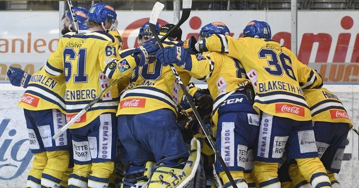 Storhamar players celebrate after Joakim Jensen scored the 2-1 goal during an ice hockey match between Storhamar and Sparta Sarpsborg that lasted more than 8 and a half hours in CC Amfi, Hamar, Norway, Monday March 13, 2017. (Fredrik Olastuen/NTB Scanpix via AP)