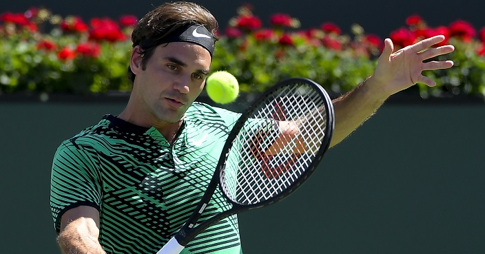 Roger Federer, of Switzerland, hits to Jack Sock during a semifinal match at the BNP Paribas Open tennis tournament, Saturday, March 18, 2017, in Indian Wells, Calif. (AP Photo/Mark J. Terrill)