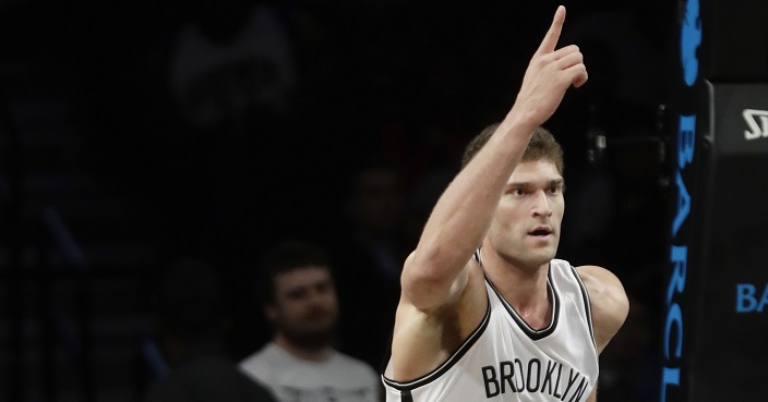 Brooklyn Nets' Brook Lopez gestures to teammates after scoring during the second half of an NBA basketball game against the Phoenix Suns on Thursday, March 23, 2017, in New York. The Nets won 126-98. (AP Photo/Frank Franklin II)