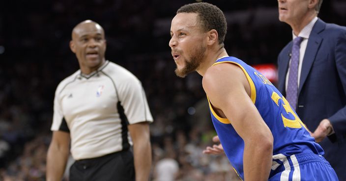 Golden State Warriors guard Stephen Curry reacts after a play during the second half of an NBA basketball game against the San Antonio Spurs, Wednesday, March 29, 2017, in San Antonio. Golden State won 110-98. (AP Photo/Darren Abate)