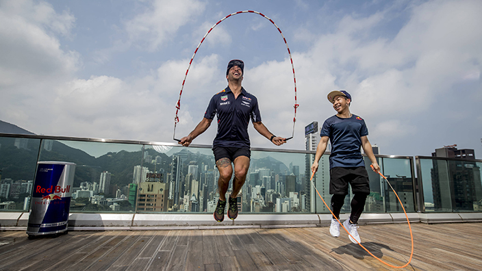 Daniel Ricciardo jumps rope with rope skipping world champion Timothy Ho Chu-ting at the Causeway Bay rooftop in Hong Kong, China on April 5, 2017. // Brian Ching See Wing / Red Bull Content Pool // P-20170405-00540 // Usage for editorial use only // Please go to www.redbullcontentpool.com for further information. //