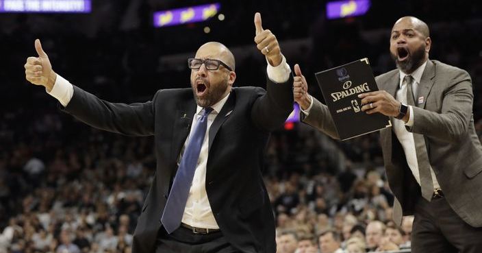 Memphis Grizzlies head coach David Fizdale, left, and assistant J.B. Bickerstaff, right, argue a call during the second half in Game 2 of a first-round NBA basketball playoff series against the San Antonio Spurs, Monday, April 17, 2017, in San Antonio. San Antonio won 96-82.(AP Photo/Eric Gay)