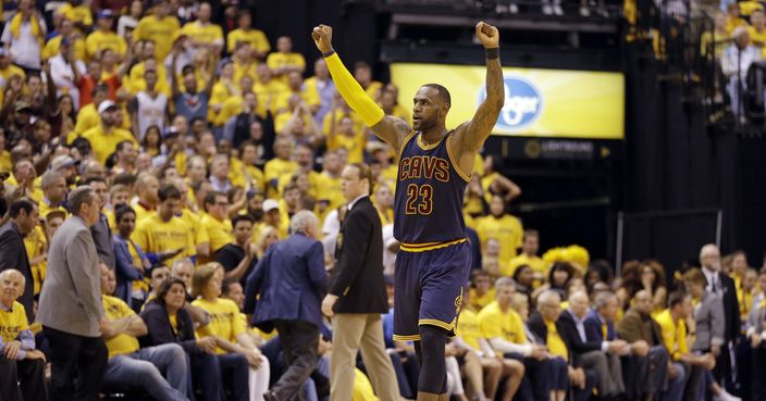 Cleveland Cavaliers forward LeBron James (23) celebrates a basket during the second half against the Indiana Pacers in Game 3 of a first-round NBA basketball playoff series, Thursday, April 20, 2017, in Indianapolis. The Cavaliers defeated the Pacers 119-114. (AP Photo/Michael Conroy)