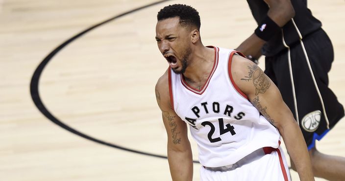 Toronto Raptors guard Norman Powell (24) reacts after dunking against the Milwaukee Bucks during the second half of game five of an NBA first-round playoff series basketball game in Toronto on Monday, April 24, 2017. (Nathan Denette/The Canadian Press via AP)