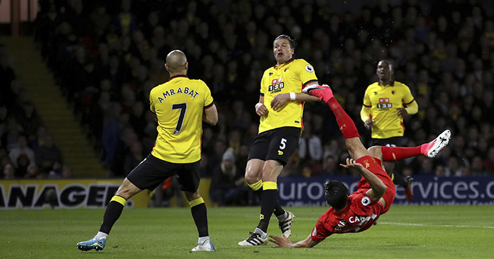 Liverpool's Emre Can scores against Watford during the English Premier League soccer match at Vicarage Road, London, Monday May 1, 2017. (John Walton/PA via AP)