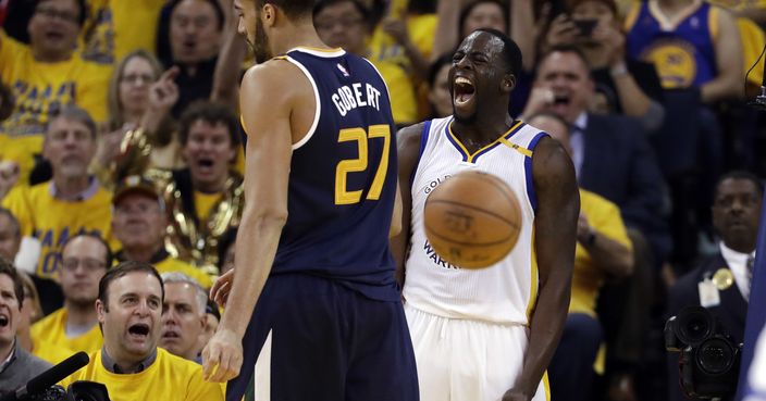 Golden State Warriors' Draymond Green, right, celebrates after scoring next to Utah Jazz's Rudy Gobert (27) during the second half in Game 2 of an NBA basketball second-round playoff series, Thursday, May 4, 2017, in Oakland, Calif. (AP Photo/Marcio Jose Sanchez)
