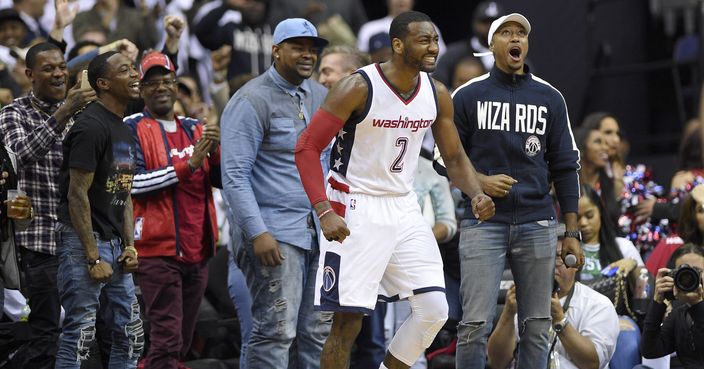 Washington Wizards guard John Wall (2) reacts during the second half in Game 4 of a second-round NBA basketball playoff series against the Boston Celtics, Sunday, May 7, 2017, in Washington. (AP Photo/Nick Wass)