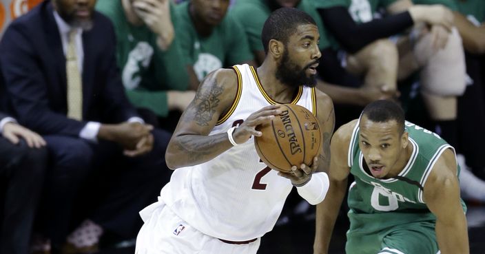 Cleveland Cavaliers' Kyrie Irving (2) drives against Boston Celtics' Avery Bradley (0) during the first half of Game 4 of the NBA basketball Eastern Conference finals, Tuesday, May 23, 2017, in Cleveland. (AP Photo/Tony Dejak)