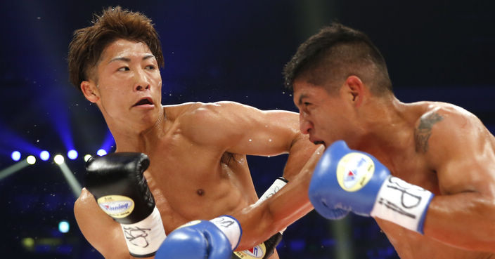 Japanese champion Naoya Inoue, left, dodges a punch from Ricardo Rodriguez of the U.S. in the third round of their WBO super flyweight boxing world title match in Tokyo, Sunday, May 21, 2017. Inoue knocked out Rodriguez in the round. (AP Photo/Toru Takahashi)