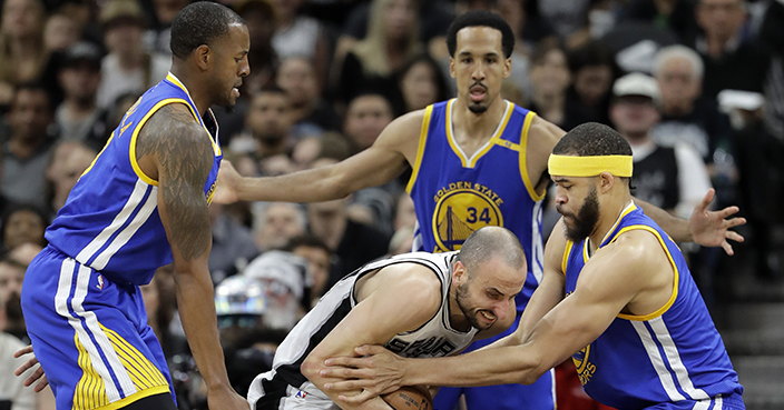 Golden State Warriors' Andre Iguodala, left, Shaun Livingston, rear, and JaVale McGee, right, challenge San Antonio Spurs' Manu Ginobili, center of Argentina for control of the ball during the first half in Game 4 of the NBA basketball Western Conference finals, Monday, May 22, 2017, in San Antonio. (AP Photo/Eric Gay)
