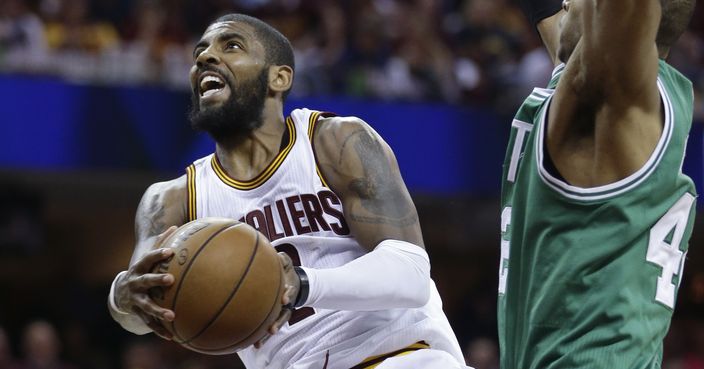 Cleveland Cavaliers' Kyrie Irving (2) goes up for a shot against Boston Celtics' Al Horford (42), from Dominican Republic, during the second half of Game 4 of the NBA basketball Eastern Conference finals, Tuesday, May 23, 2017, in Cleveland. (AP Photo/Tony Dejak)